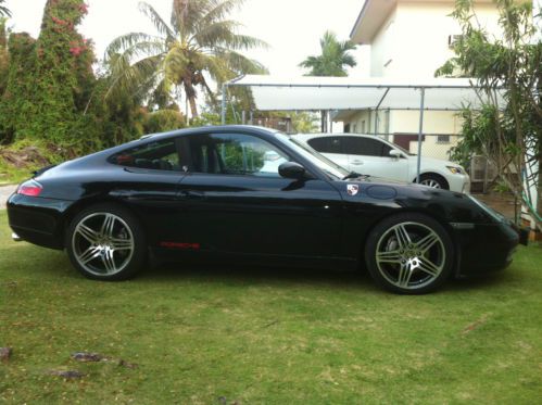 Black on black porsche carrera 4 coupe