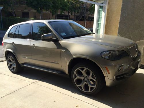 2010 bmw x5 xdrive48i sport utility 4-door 4.8l - gold