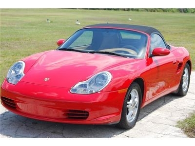 04 boxster only 18k miles,2 owner,5 speed manual,,custom head rest,xenon lights