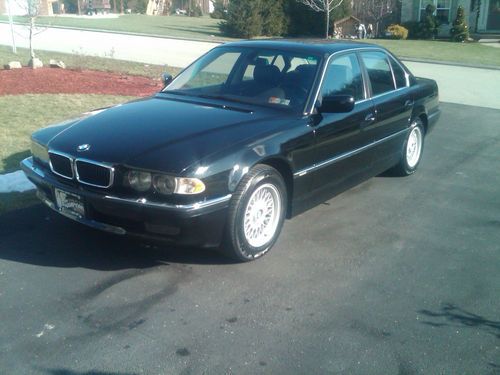 Black 2001 bmw 740i, sport shift, 6cd changer, 4.4l v8 342 hp with chip, loaded.