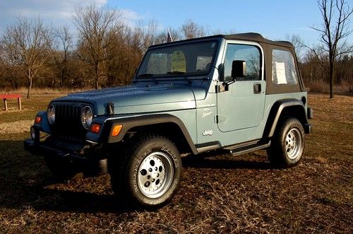 1998 jeep wrangler sport, 4.0 liter 6 cylinder, automatic trans, 4 wd, p.s. a.c.