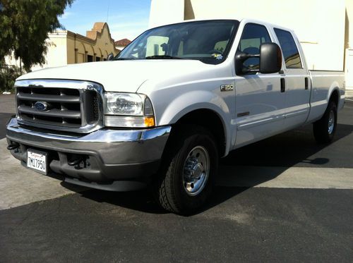 2004 ford f-350 super duty xlt crew cab diesel... only 66k miles!!!