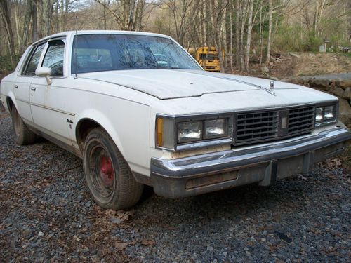 1987 oldsmobile cutlass supreme brougham sedan 4-door 5.0l