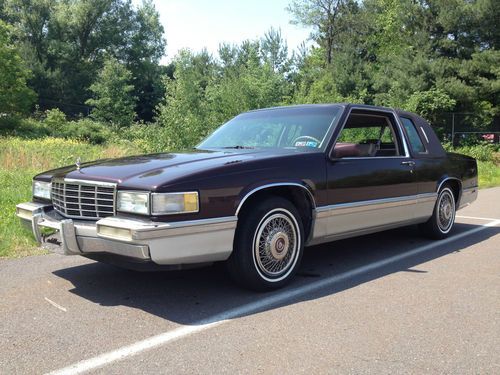 1991 cadillac coupe deville 91,000 miles dark auburn with tan leather interior