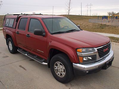 2005 gmc canyon crew cab / 4x4 / 5 cyl / cloth / topper / clean truck