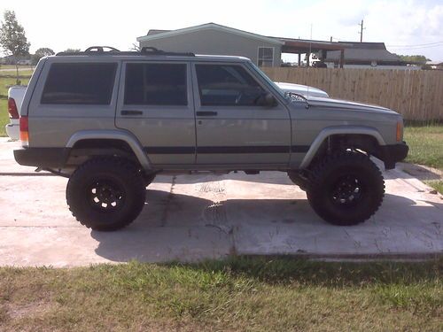 2001 jeep cherokee sport,new lift,tires,rims