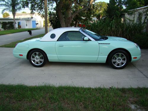 2004 thunderbird in vintage mint green - white performance interior - white top