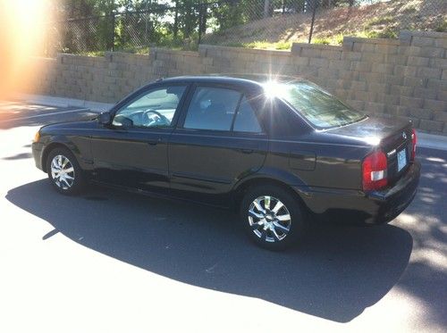 1999 mazda protege lx sedan 4-door 1.6l