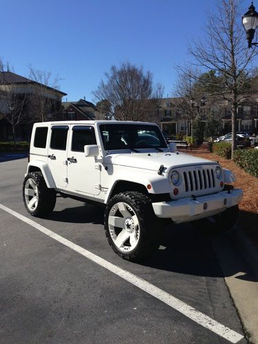 2007 4 door jeep wrangler custom,24rims,lifted,sound system,custom interior,etc!