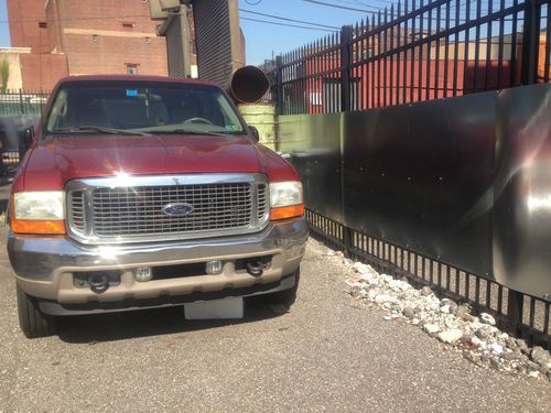 Red 2001 ford excursion