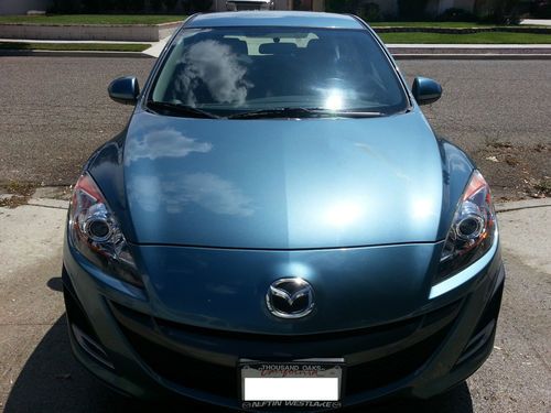 2011 mazda s3 only 2,385 miles.