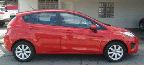 2012 ford fiesta hatchback with sync technology in red!!