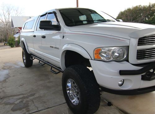 2004 dodge 2500 diesel custom, one owner larime loaded lift no rust