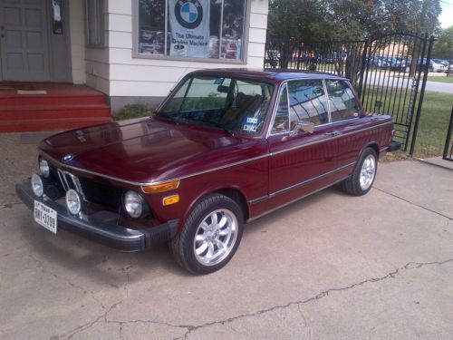 1976  bmw 2002 malaga red, new bucksin leather interior, all new