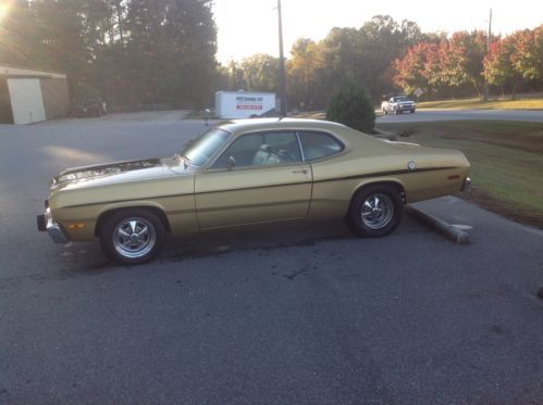 1973 plymouth duster survivor , gold on gold