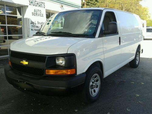 2012 chevy 1500 express-22k miles-e track  rails and carpeted interior.