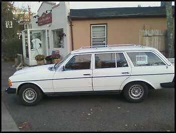 White mercedes wagon, roof rack