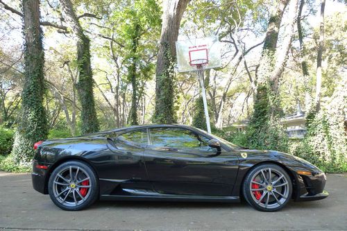 2009 ferrari 430 scuderia, black metallic with stripe. red calipers