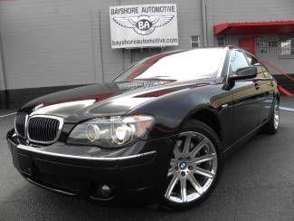 750li*black/black*lux seats*shades*carfax cert*chrome 19"s*we finance/trade*fla