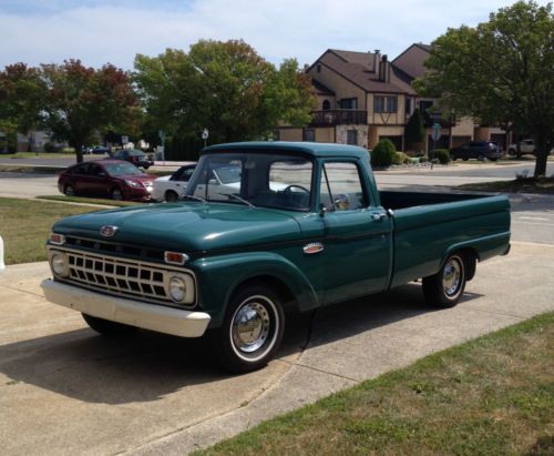 1965 green ford f-100 with mostly original parts-starts up and drives good!