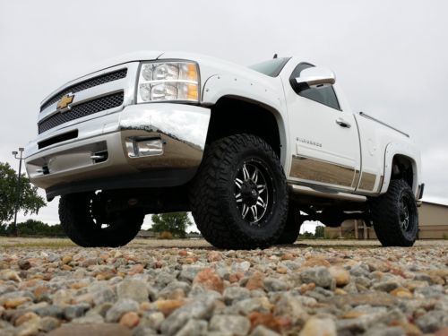 2012 chevy silverado reg cab 4x4 rmt lifted w/ only 18k miles