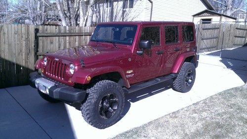 2013 jeep wrangler sahara red, matching top, lifted