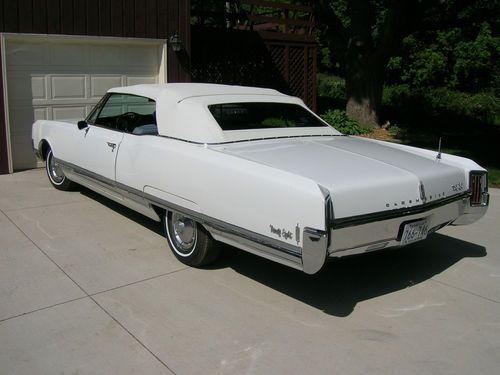 1965 oldsmobile 98 convertible white with white top 78,500 2 owner miles