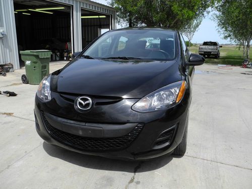 2011 mazda 2 4dr. automatic  same as ford fiesta