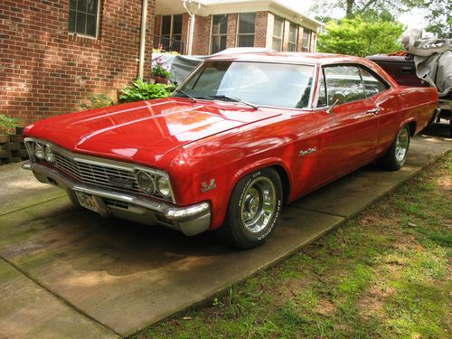 Beautiful 1966 chevy impala with a 454 big block engine and turbo 350 trans