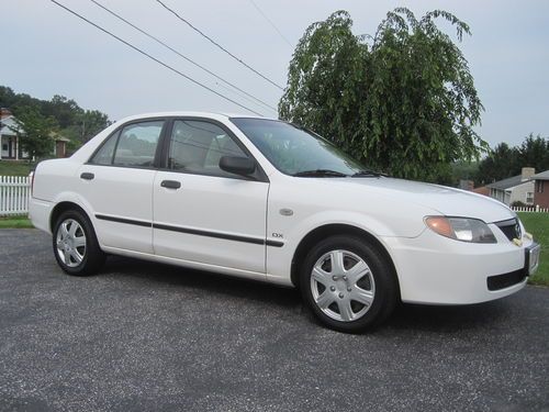 2003 mazda protege dx sedan 4-door 2.0l,  91,406 miles, md inspected.