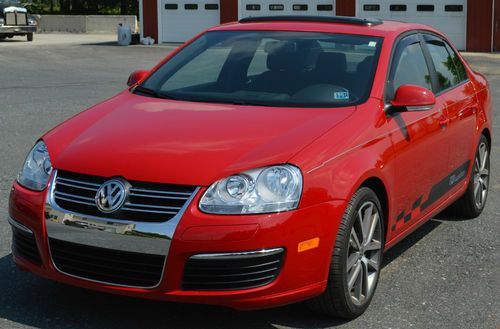 Tdi cup edition 2010 sedan salsa red color four doors six speeds