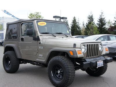 Jeep wrangler x 4.0 soft top 4wd power ac rear seat automatic khaki lifted tilt