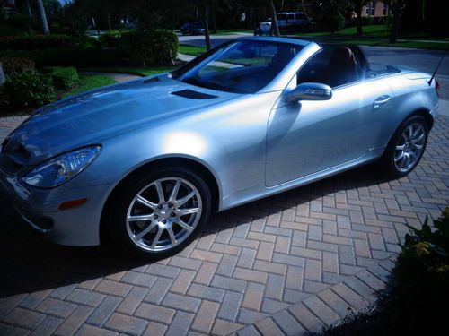 2006 slk 350 with 21,300 miles with diamond silver and burgandy leather