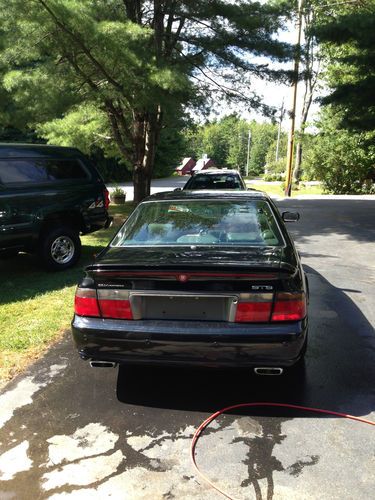 Black cadillac sts , moonroof, nav, black leather northstar