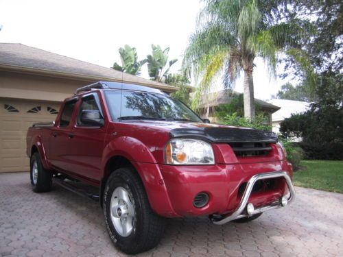 02 nissian frontier crew cab 4dr 4x4 6cyl supercharged auto 1 fl owner very nice