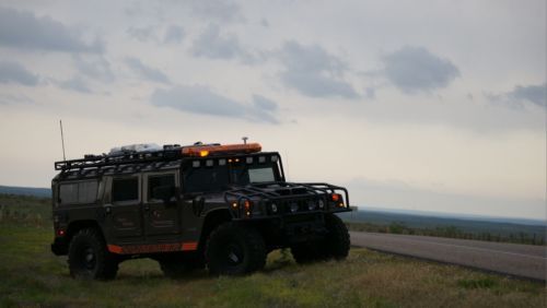 Baddest custom 6.6 duramax h1 hummer! storm chasing survival/rescue - seen on tv