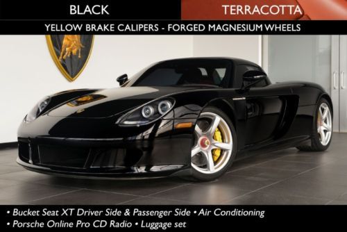 Only 3,050 miles! original msrp $448,880; black/terracotta