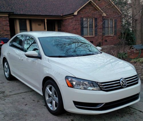 2012 volkswagen passat, low miles! white w/ black leather, gas saver, smells new