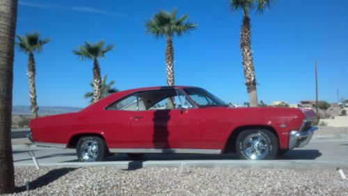 1965 chevrolet impala 283 ci shiny red must see and drive. drive it home today