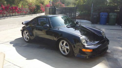 1980 black porche 911 sc with 993 style body upgrade