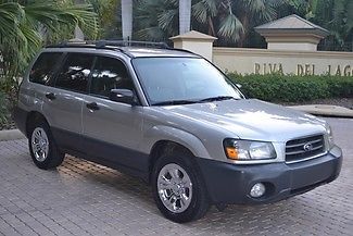 2005 subaru forester 2,5x awd silver runs great, cold chrome hubcaps no reserve