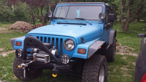 Lifted!!! 1999 jeep wrangler sport  4.0l