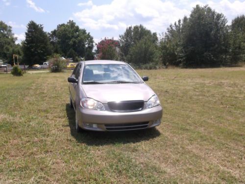 2003 toyota corolla 161k, very nice condition, light on gas, ice cold a/c **look