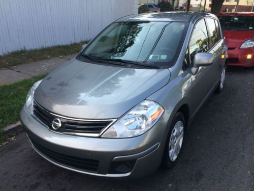 2012 nissan versa  hatchback only 12k miles drives and runs 100% no reserve !!