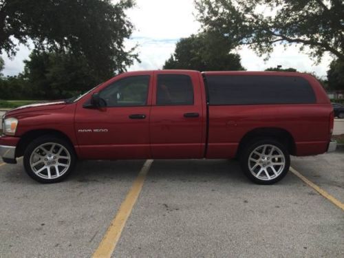 Quad cab, red, fair condition, unique back topper, 22&#034; srt rims