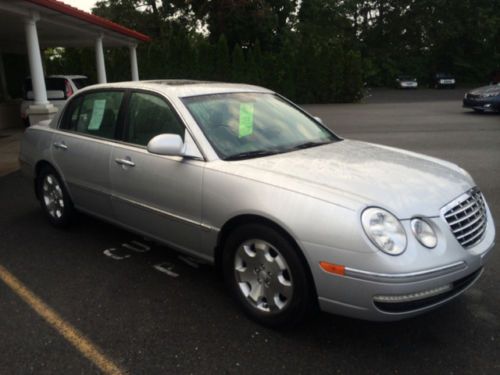 Silver 4 door amanti gray leather interior sunroof low miles carfax two owners