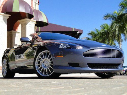 Garage kept 1 owner aston db9 only 7k miles special order colors premium sound l