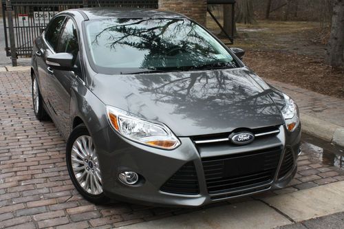 2012 focus sel.no reserve.leather/navi/heated/sync/titanium pkg./pstart/rebuilt