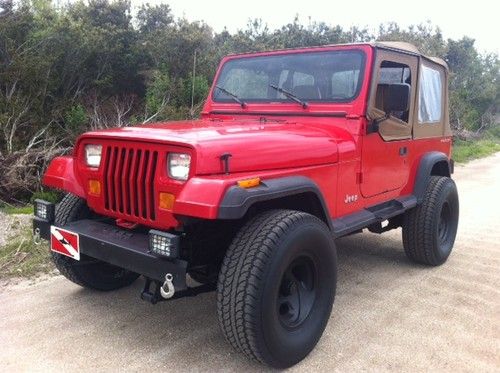 1994 jeep wrangler yj lifted 33s red tan softtop offroad lights antenna 4x4