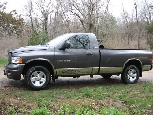 Hard to find long box regular cab 4.7 v8 4x4 sport! bedliner &amp; cover runs good!!